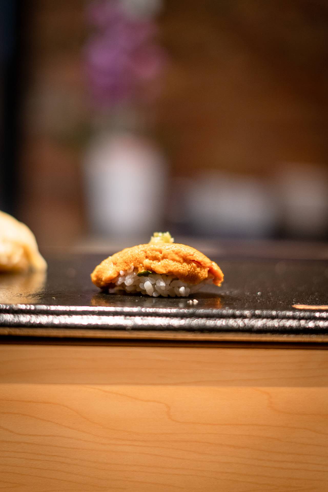 Fresh uni sea urchin nigiri at omakase counter